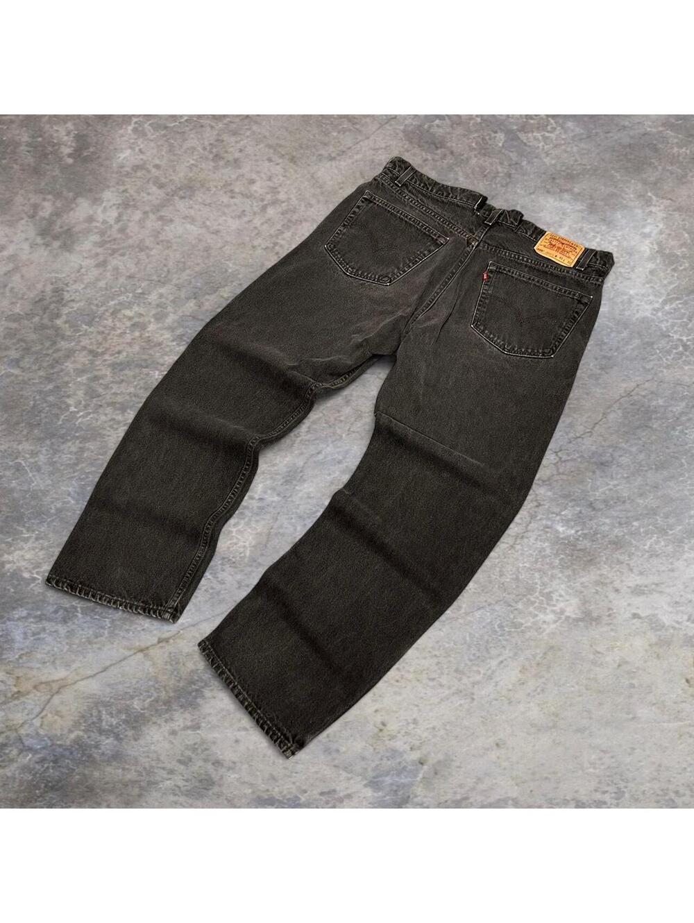 Black Levi's 505  jeans with faded details jeans
